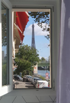 Гостиница Loft 5 places with view on Eiffel Tower  Париж